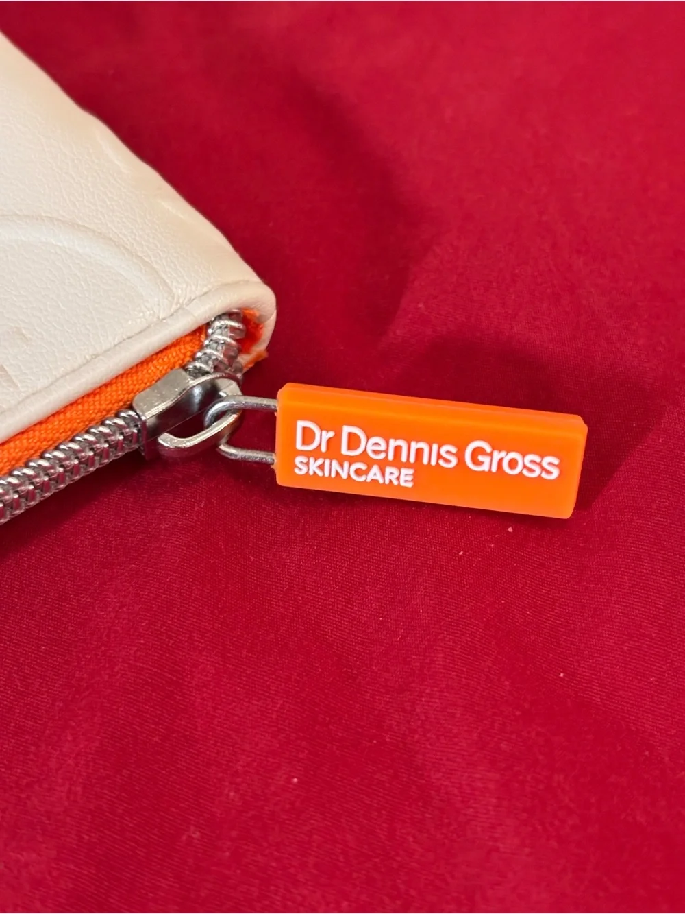 Dr Dennis Gross Skincare Bag WhiteOrange Zip Pouch. Brand New.